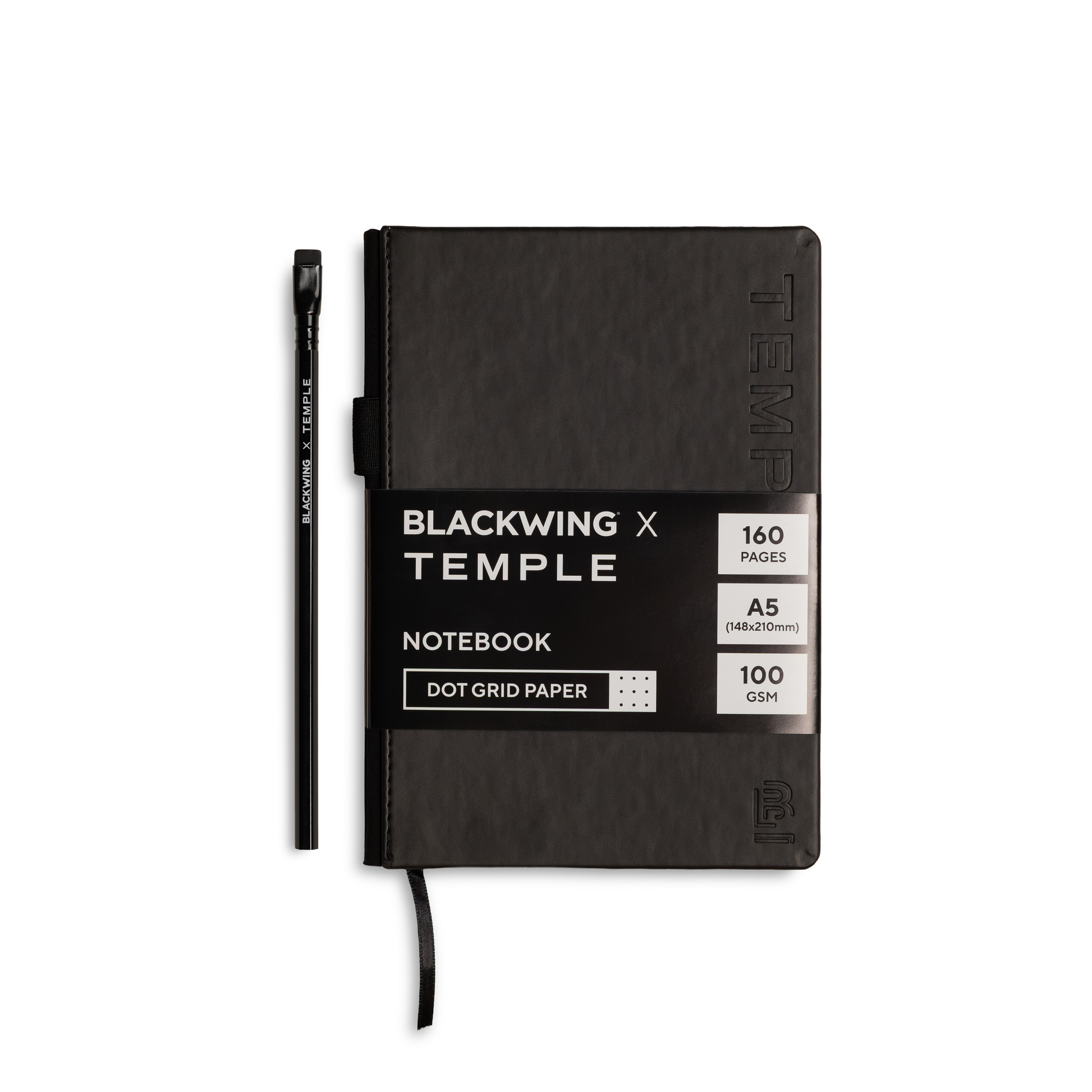 Blackwing x Temple notebook in black with a matching black pen, shown on a clean white background. The notebook features a textured cover, a black elastic closure, and a black ribbon bookmark.