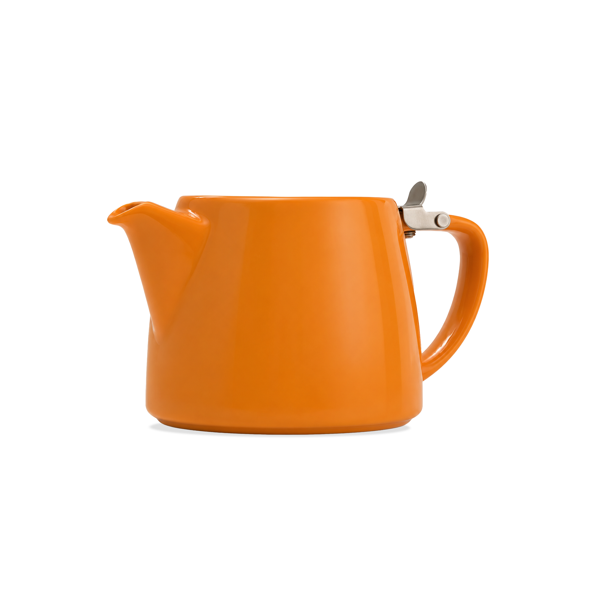 An orange ceramic teapot with a matching orange handle and spout, featuring a small silver metal tea infuser resting on the side, set against a plain white background.