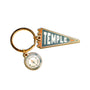 Keychain with 'Temple' pennant and compass charm on a white background