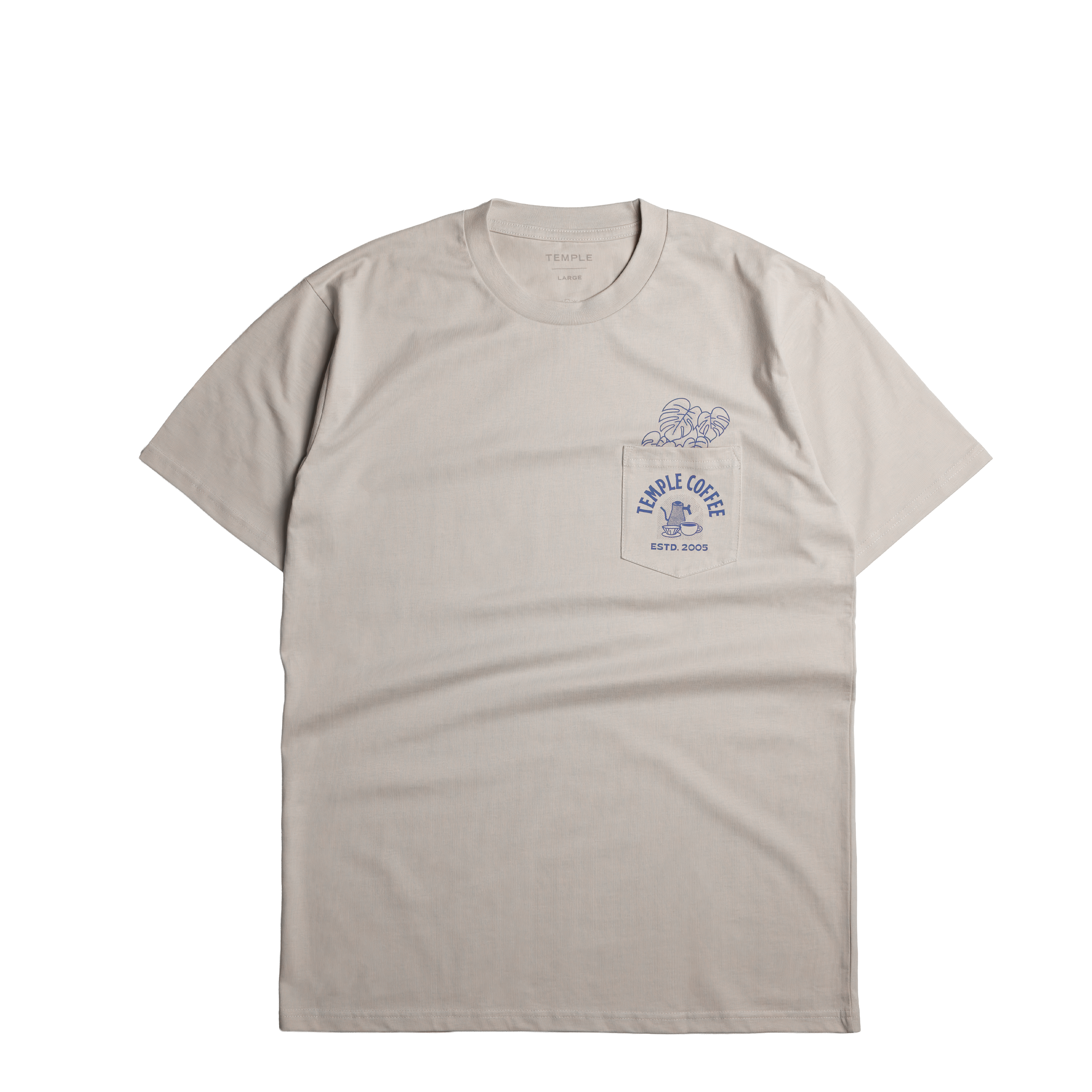 A light beige crewneck t-shirt with a small blue graphic on the left chest pocket, featuring a pocket elephant and the text 'PIMPLE COFFEE ESTD 2021'.