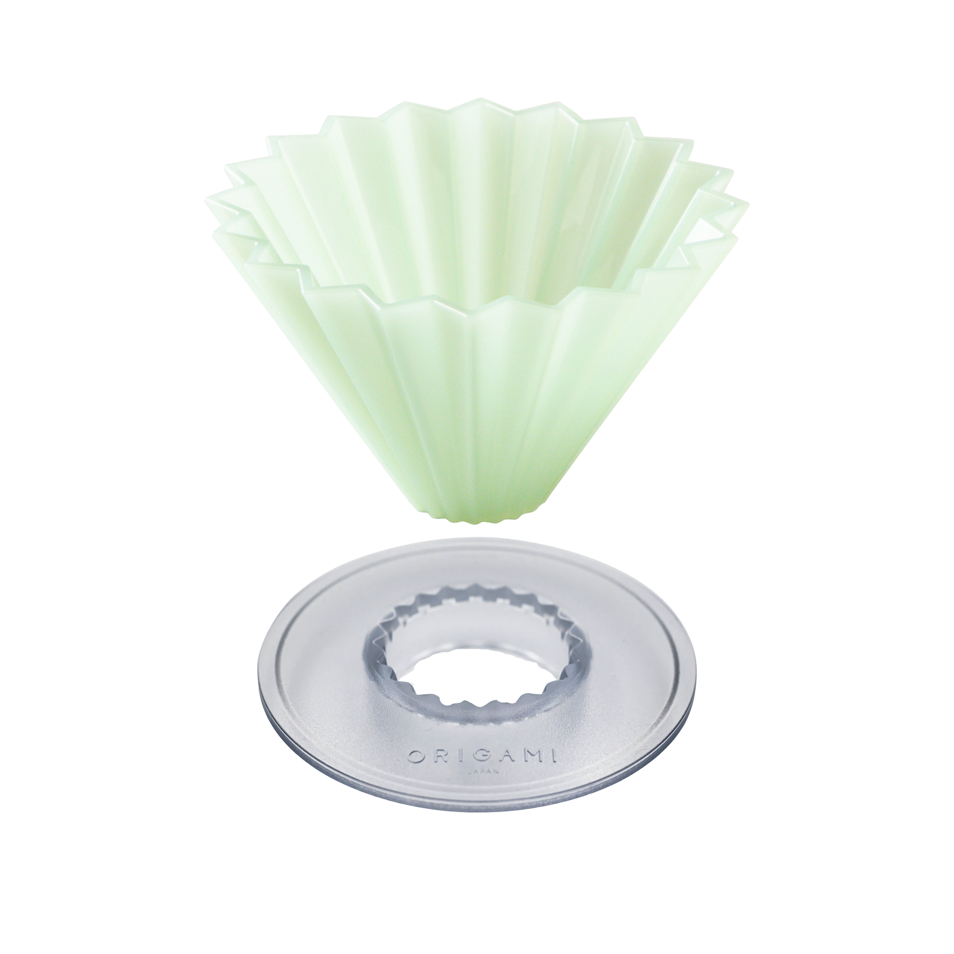 An Origami cone-shaped silicone mold in an off-white color, shown with its clear plastic circular base on a solid white background.